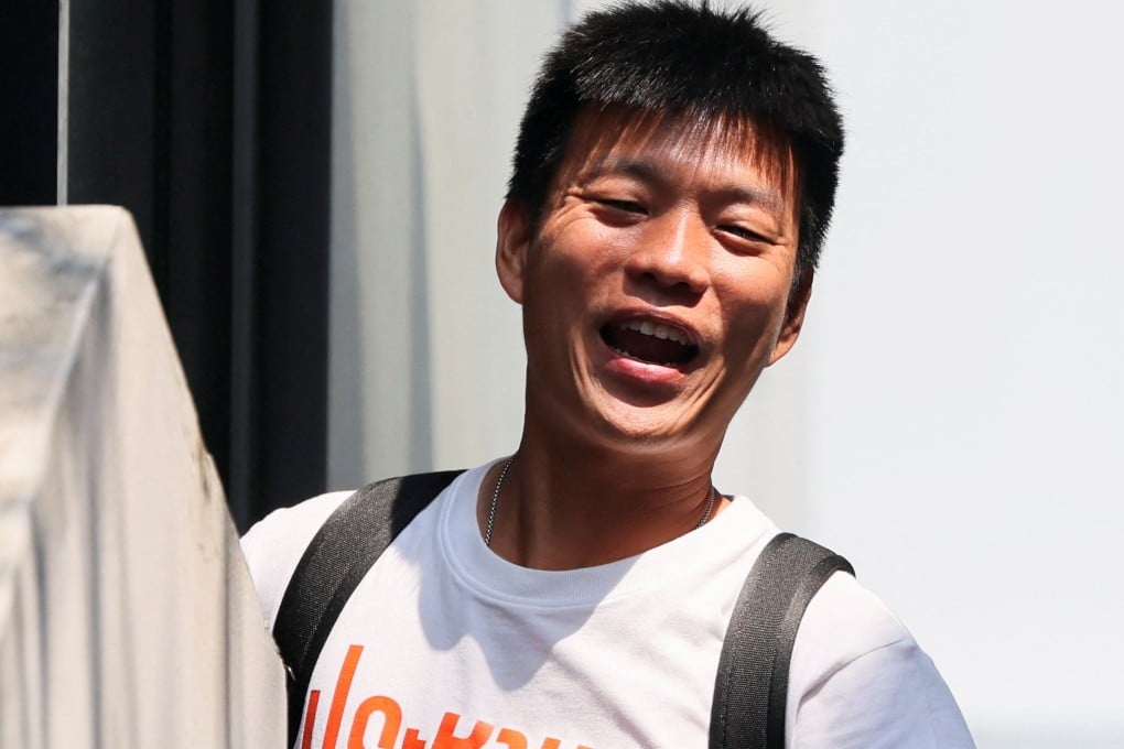 Natthaphong Ruengpanyawut arrives at the headquarters of the People’s Party after the Bhumjaithai Party won the general election on Sunday. Photo: Reuters