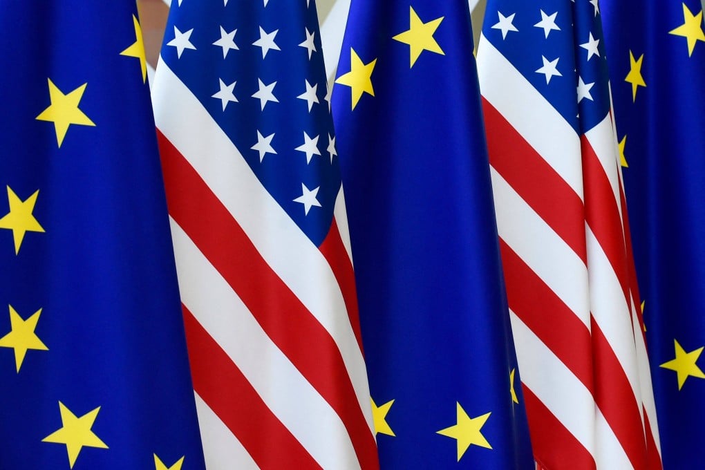 US and European Union flags at the EU headquarters in Brussels. Photo: AFP