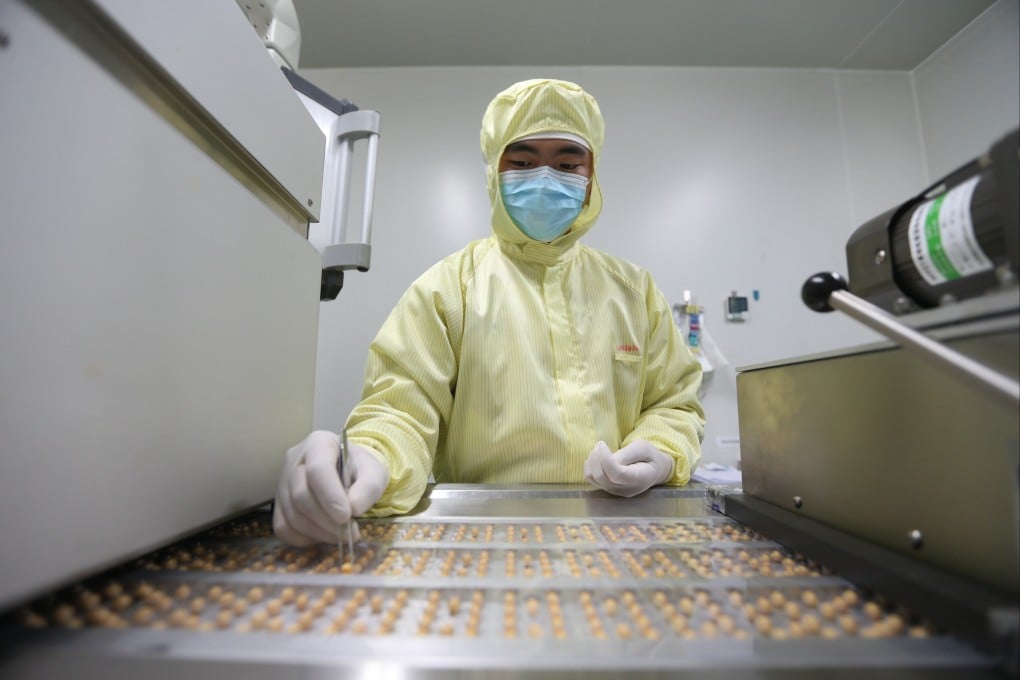 An employee works on a drug production line at a pharmaceutical company in Meishan, China, on January 30, 2024. Photo: NurPhoto via Getty Images