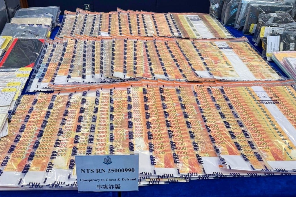 Stacks of money are displayed as evidence in a scam case. There were 43,212 scam cases last year, according to police. Photo: Handout