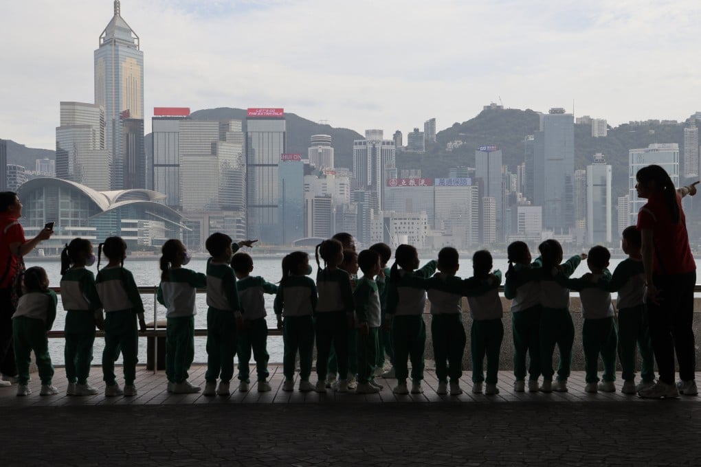 A group of kindergarten students visit Victoria Harbour with their teacher in Tsim Sha Tsui on March 13, 2025. Photo: Jelly Tse