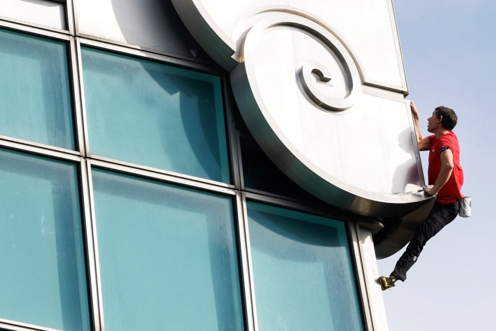 Climber Alex Honnold free solos the Taipei 101 skyscraper in Taipei, Taiwan, on January 25, 2026. Photo: Reuters