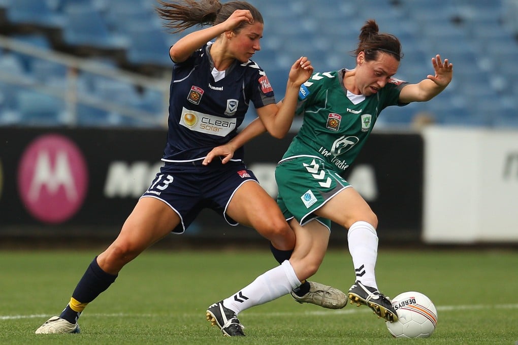 Leah Blayney (right), seen here playing for Canberra in the W-League in 2011, played 16  matches for Australia’s national side. Photo: Getty Images