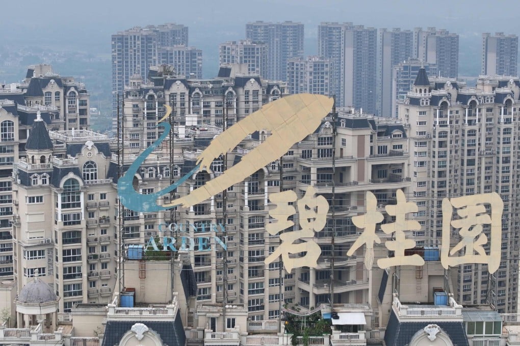 This aerial photo taken on October 10, 2023 shows the logo of Country Garden Holdings on top of a building in Zhenjiang, in China’s eastern Jiangsu province. Photo: AFP