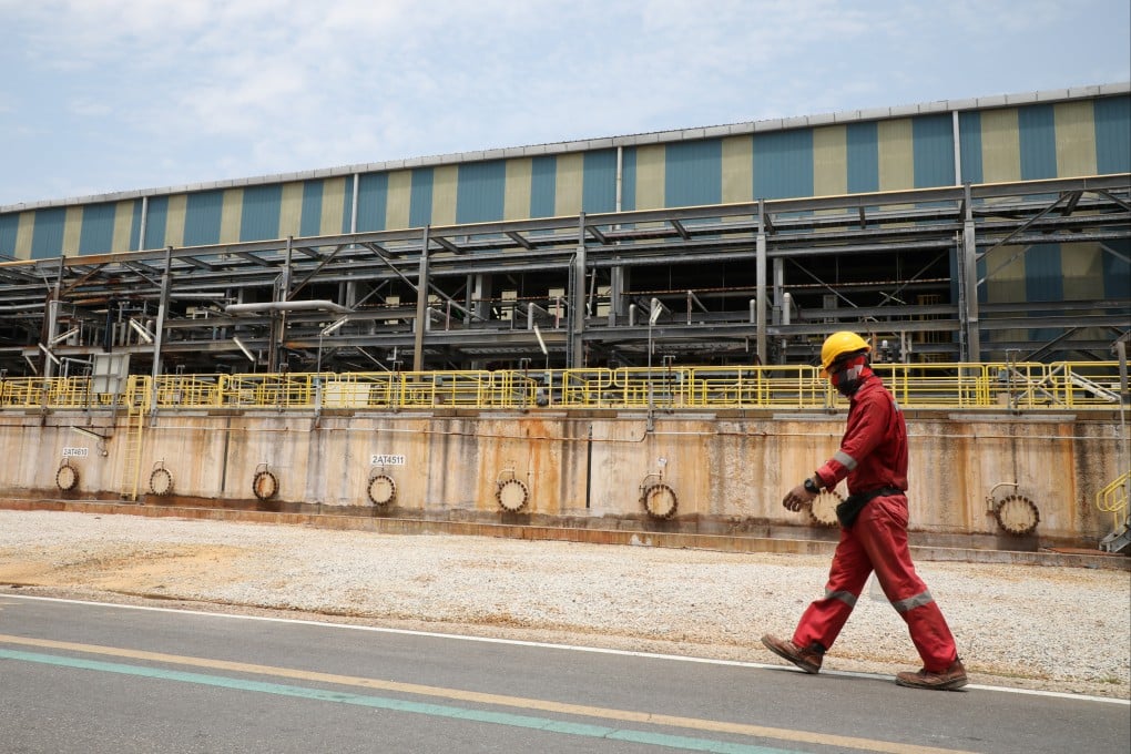 A worker walks inside the Lynas Advanced Materials Plant in Gebeng, Pahang. Malaysia says it aims to expand downstream processing of rare earths rather than export raw materials. Photo: Reuters