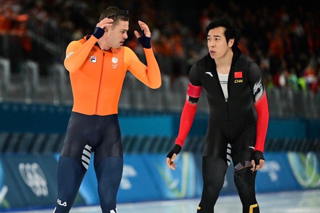 The Netherlands’ Joep Wennemars (left) and China’s Lian Ziwen after their pairs race in the speed skating 1000m event at the Milano Cortina Games on Wednesday. Photo: AFP