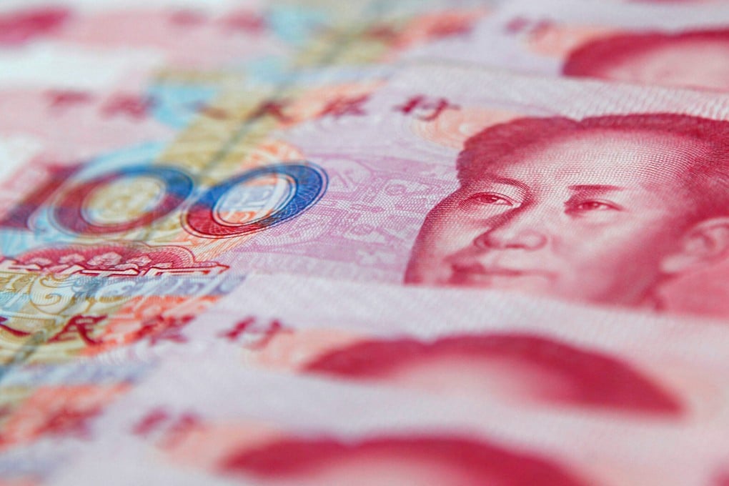 The People’s Bank of China on Wednesday set the yuan’s midpoint rate – the daily fixing – at 6.9438 per US dollar, its strongest level in nearly three years. Photo: Reuters