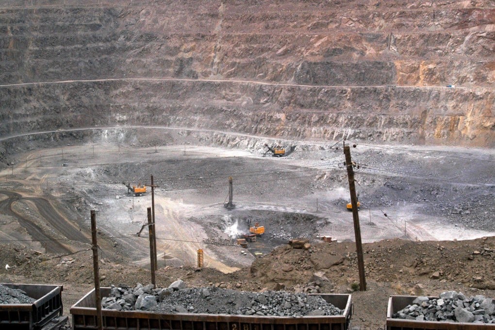 Workers use machinery to dig for rare earths at a mine in China’s northern Inner Mongolia autonomous region. Photo: AP