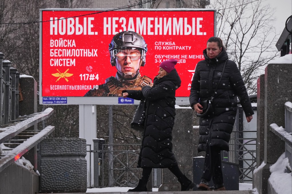 A billboard in St Petersburg advertising contract Russian military service. It reads: ‘New. Irreplaceable. Unmanned Systems Troops’. Photo: AP