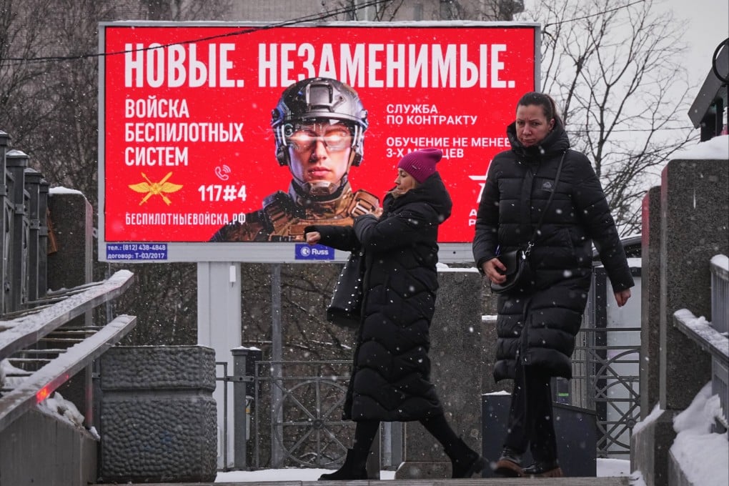 A billboard in St Petersburg advertising contract Russian military service. It reads: ‘New. Irreplaceable. Unmanned Systems Troops’. Photo: AP