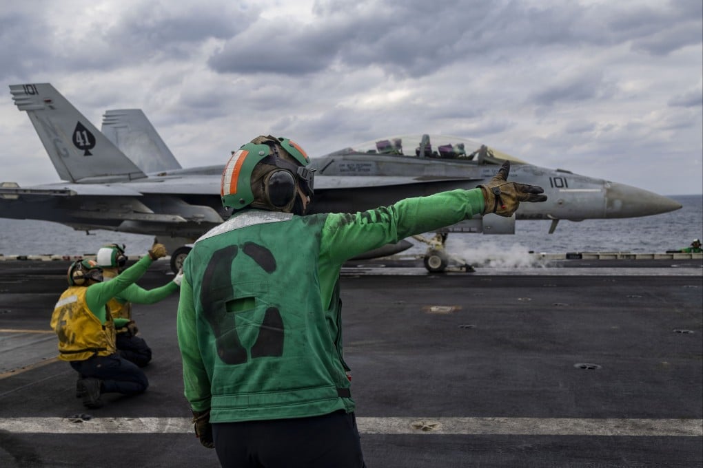 An F/A-18F Super Hornet preparing to launch from the USS Abraham Lincoln in the Arabian Sea. Photo: US Navy via EPA