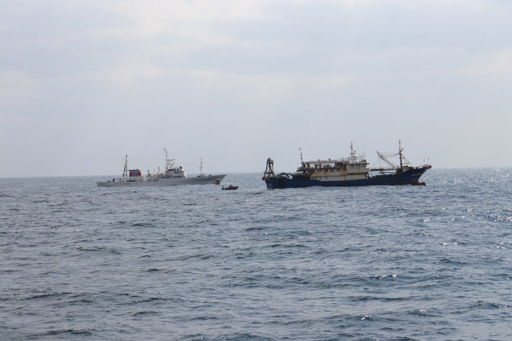 A Japanese fisheries agency patrol vessel follows the Chinese fishing vessel Qiong Dong Yu in waters off Japan’s southwest Nagasaki prefecture on Thursday. Photo: Handout