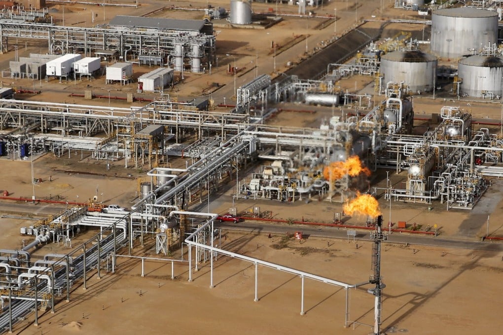 A flame burning natural gas is seen at a plant operated by Venezuela’s state oil company PDVSA in April 2015. Photo: Reuters