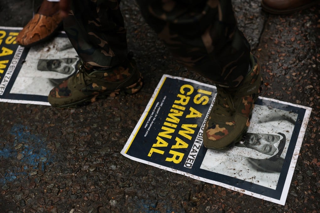 Demonstrators step on pictures of UAE’s President Sheikh Mohamed bin Zayed Al Nahyan during a protest against the UAE’s support for the RSF in Sudan, on the day of the two-year anniversary of the conflict, on April 15 last year. Photo: Reuters