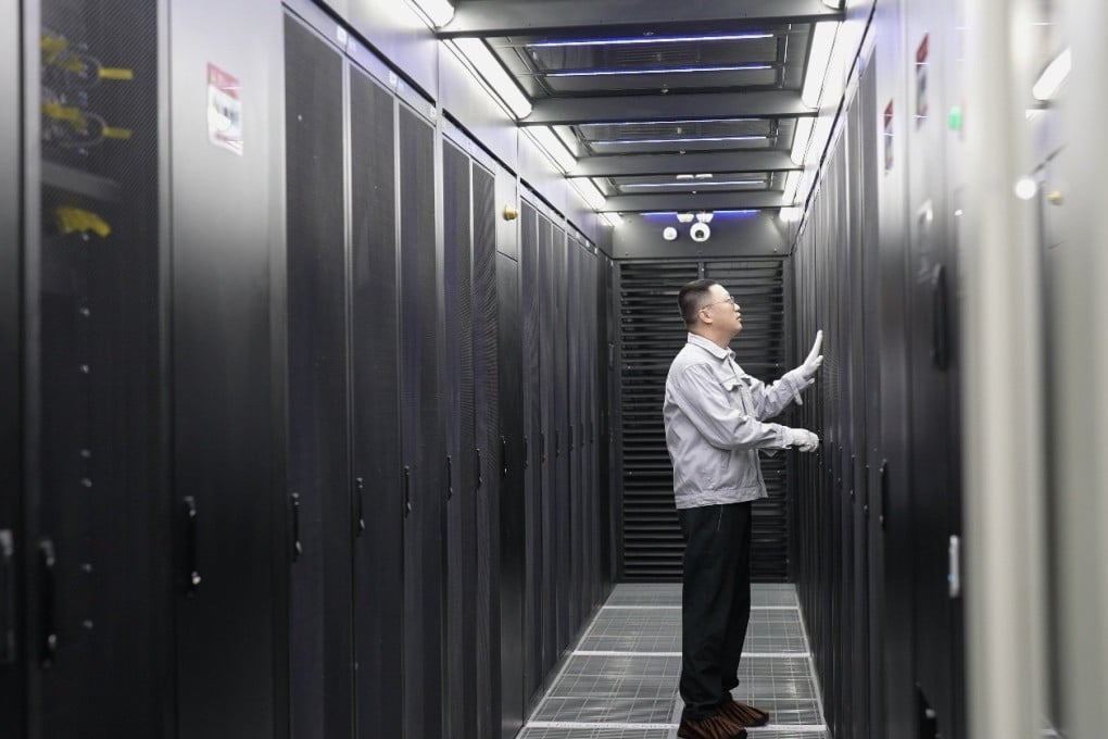 An employee conducts maintenance in a server room of the China Mobile Hohhot Data Centre in Hohhot in Inner Mongolia. Photo: Xinhua