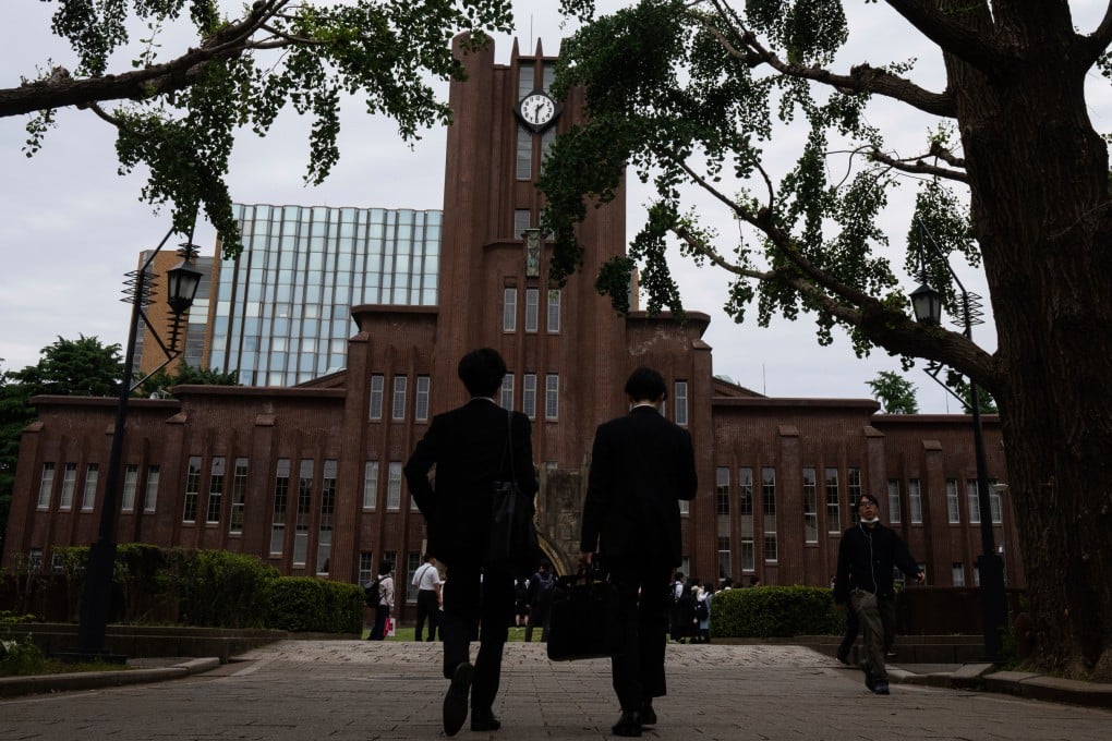 People walk through the University of Tokyo on May 27, 2025. Photo: AP