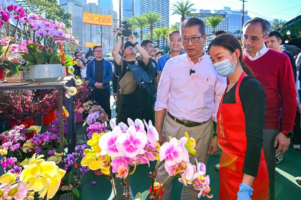 Financial Secretary Paul Chan visits the Lunar New Year flower market at Victoria Park on Valentine’s Day. Photo: Handout