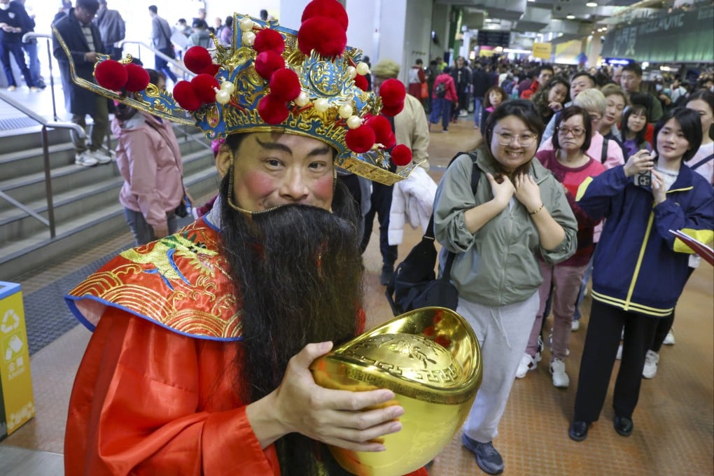 A performer dressed as the God of Wealth for Chinese New Year Raceday at Sha Tin Racecourse in 2024. Photo: Dickson Lee