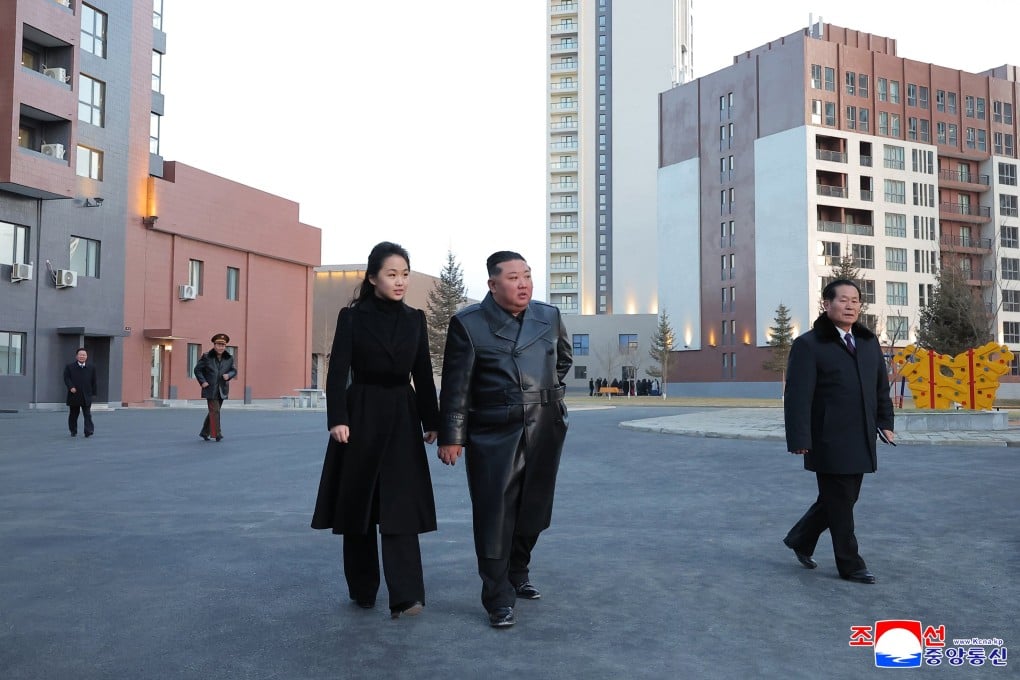 North Korean leader Kim Jong-un (centre, right) and his daughter, Kim Ju-ae, touring Saeppyol Street, a new housing district in Pyongyang dedicated to the families of fallen soldiers, on Sunday. Photo; EPA/KCNA