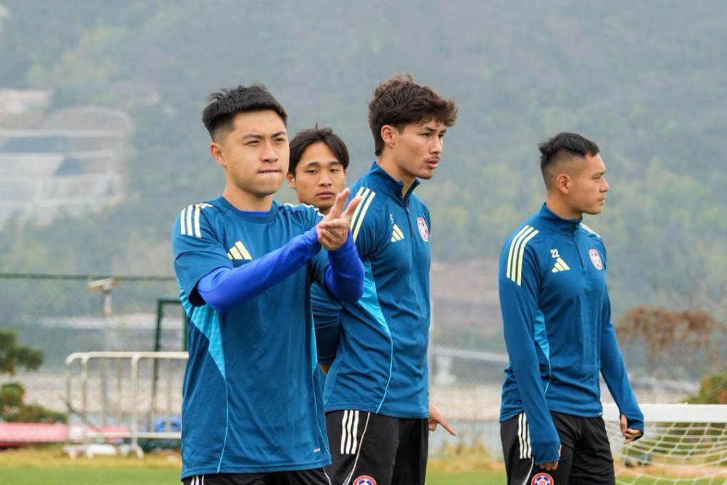 Jesse Yu on the training ground with Marco Lorenz (centre) and Leung Kwun-chung (right). Photo: Eastern