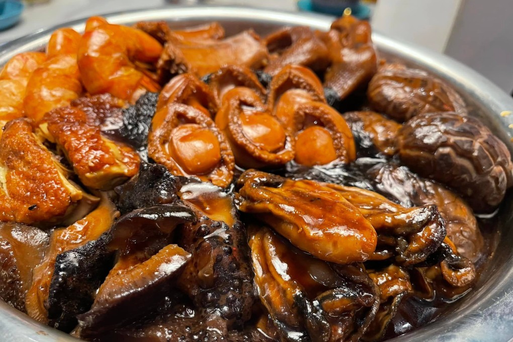 A traditional shared Lunar New Year dish, poon choi is made from layers of premium ingredients and signifies fullness and prosperity. Photo: Ser Wong Fun