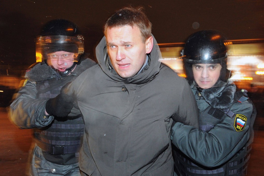 Police officers detain Alexei Navalny in Moscow on March 5, 2012. The Russian opposition leader died in an Arctic prison colony on February 16, 2024, in murky circumstances. Photo: AFP