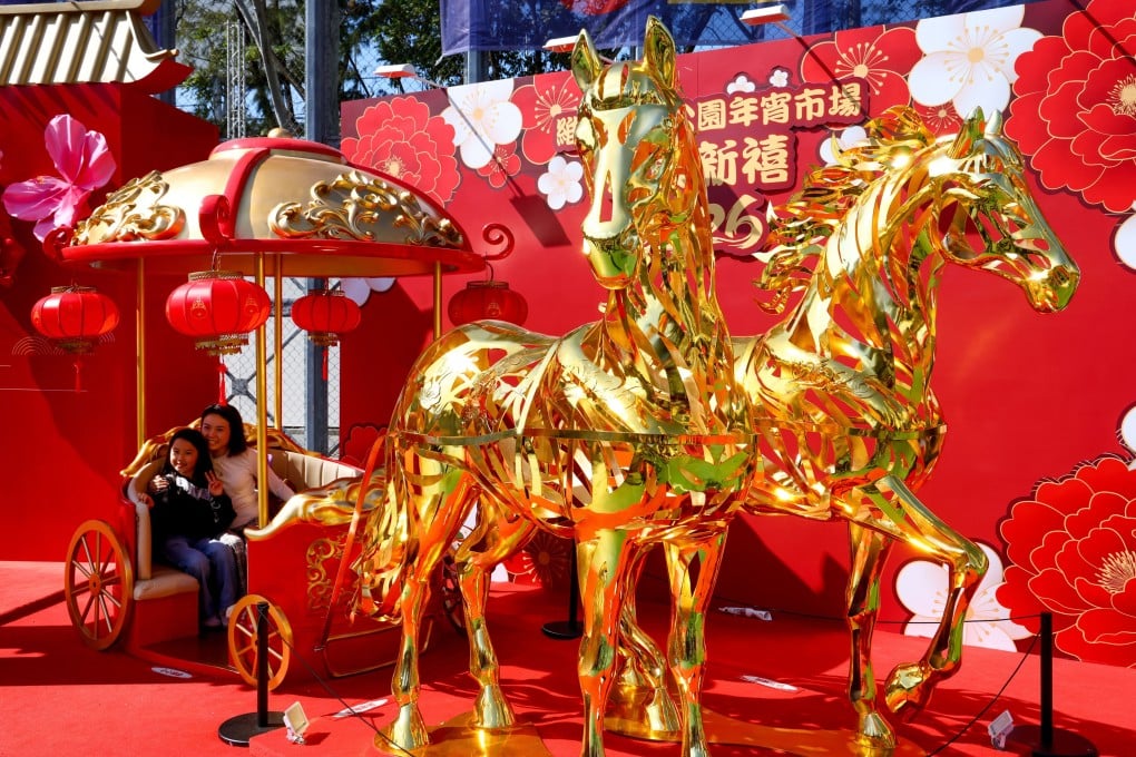 Visitors pose for pictures at the Lunar New Year fair in Victoria Park. Photo: Dickson Lee