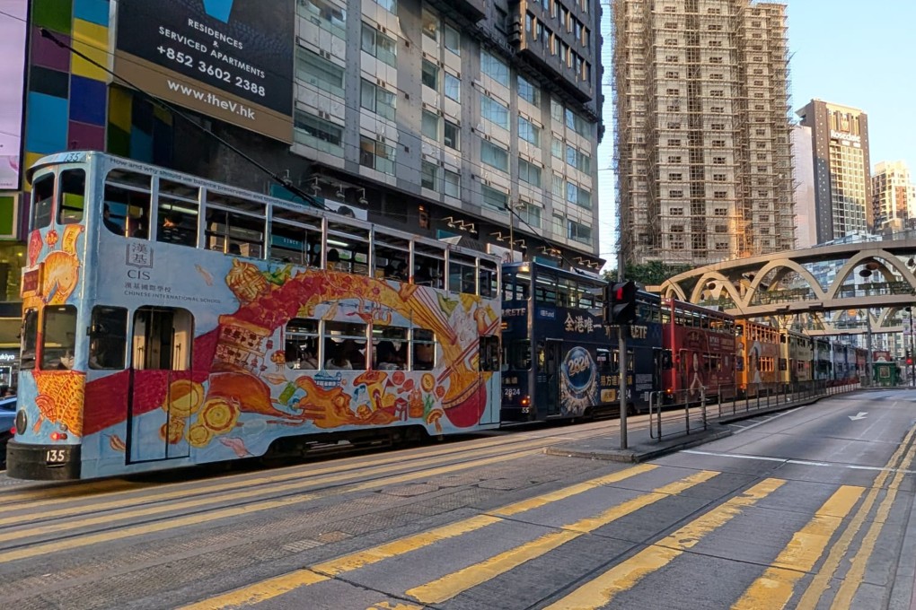 A row of trams bound for Hong Kong Island East grind to a halt on Yee Wo Street in Causeway Bay at about 5.30pm on Monday. Photo: Chieu Luu