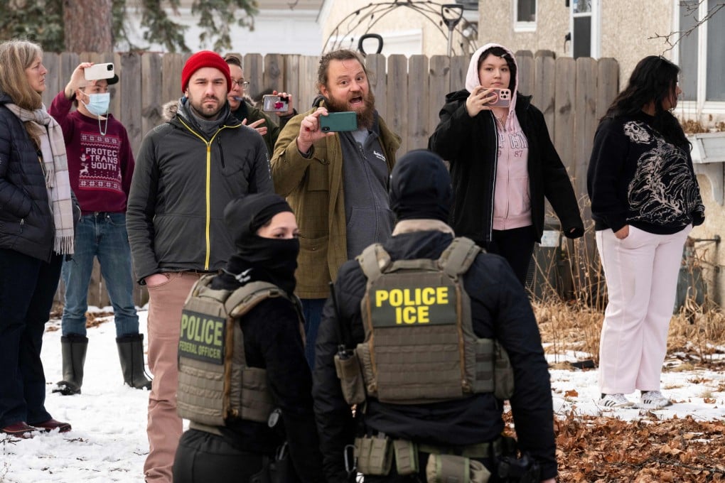 Observers film ICE agents in Minneapolis, Minnesota. Photo: AFP