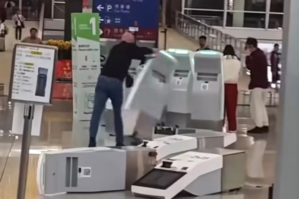 A Briton has been arrested after a video clip showed him damaging self-check-in kiosks at the airport. Photo: Facebook/hkcaml