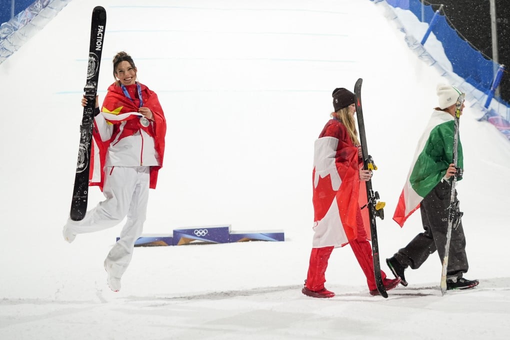 China’s Eileen Gu (left) celebrates her silver as gold medalist Megan Oldham and bronze medalist Flora Tabanelli walk away. Photo: AP