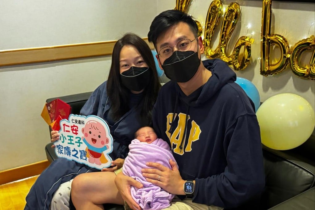 Mr and Mrs Tang with their baby boy at Union Hospital. Photo: handout