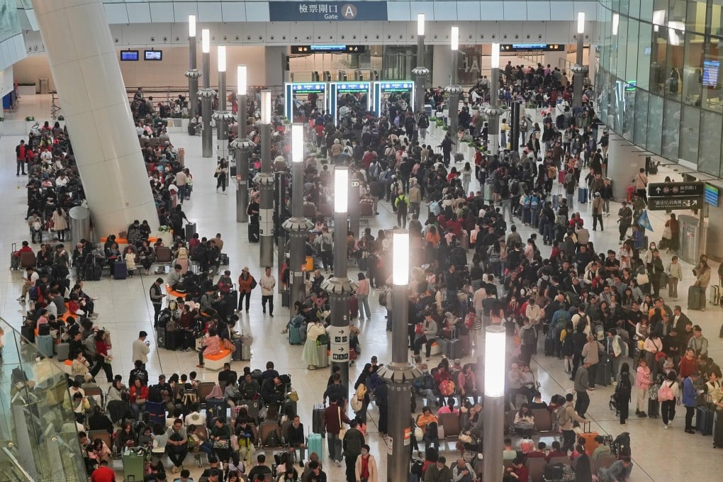 Crowds filled Hong Kong’s West Kowloon station on the first day of Lunar New Year. Photo: Elson Li