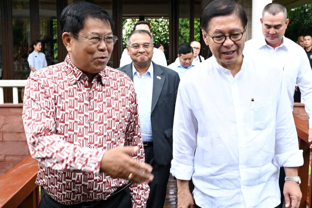 Myanmar’s Foreign Minister Than Shwe (left) chats with Thai Foreign Minister Sihasak Phuangketkeow ahead of bilateral talks in Phuket on Wednesday. Photo: Ministry of Foreign Affairs / Reuters