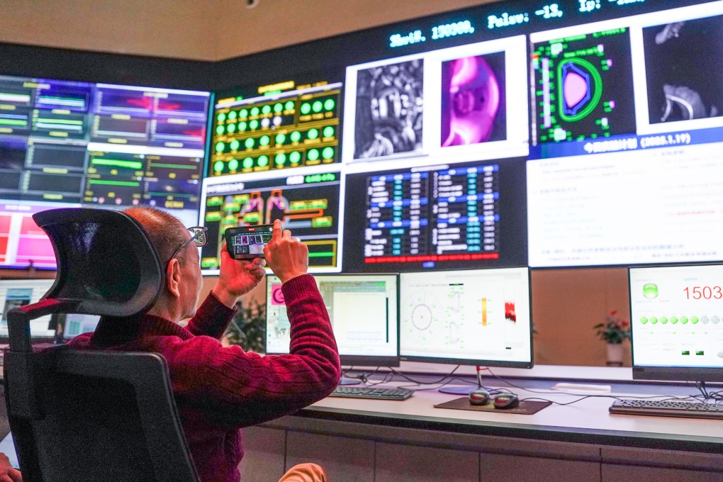 Gong Xianzu, head of division of the Experimental Advanced Superconducting Tokamak Physics and Experimental Operations, observes data during an experiment in Hefei, Anhui province, on January 19, 2025. Photo: Xinhua