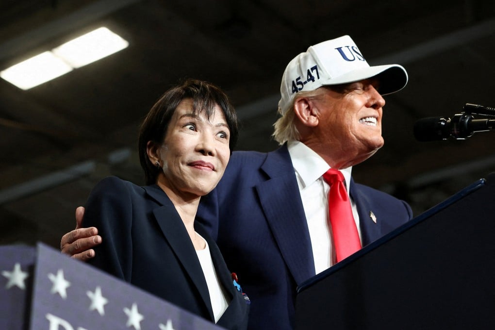 US President Donald Trump speaks alongside Japanese Prime Minister Sanae Takaichi aboard the aircraft carrier USS George Washington at the US Navy base in Yokosuka, Japan, in October. Photo: Reuters
