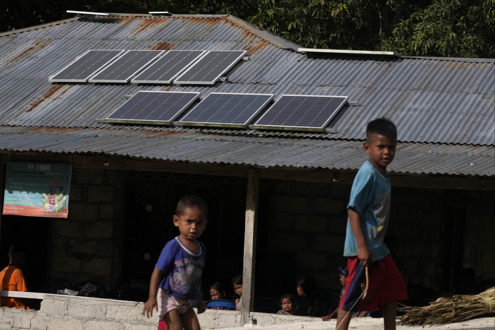 Zinc roofs on top of a house in Walatungga village, Sumba Island, Indonesia. Photo: AP