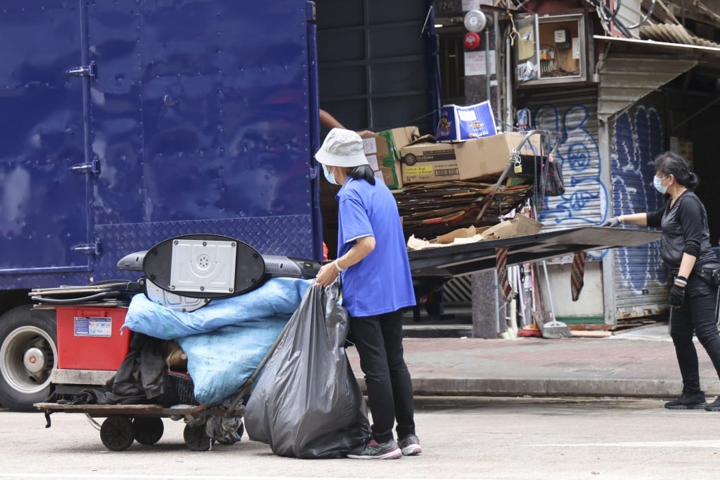Cleaning workers on the job in Mong Kok on May 1, 2025. Photo: Jelly Tse