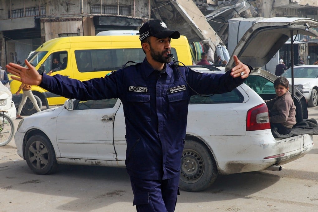 A Hamas police officer directs traffic in Gaza City on January 28. Photo: Reuters