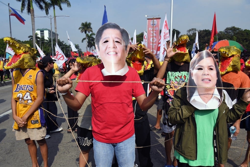 Protesters wearing face masks depicting Philippine President Ferdinand Marcos Jnr and Vice President Sara Duterte take part in an anti-corruption rally in Manila in November. Photo: AFP