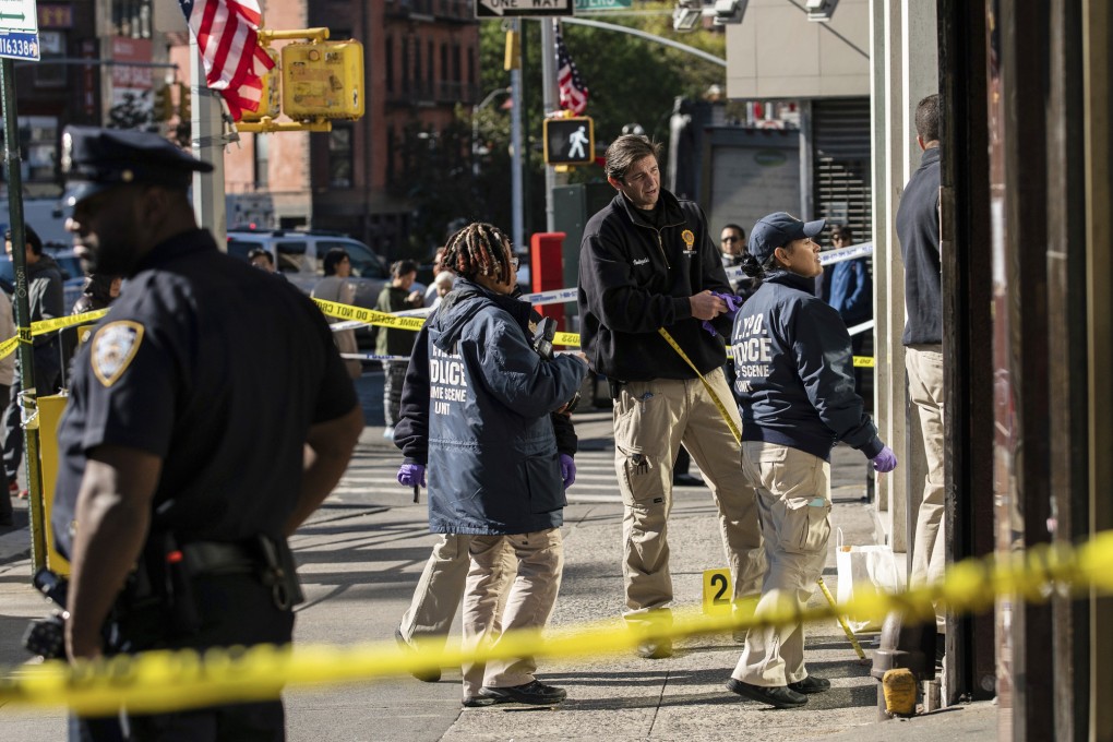 Police investigate the scene of an attack in New York’s Chinatown in October 2019. Photo: AP