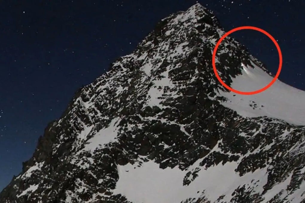 A webcam image shows Thomas P. descending Grossglockner mountain with a flashlight. Photo: www.foto-webcam.eu