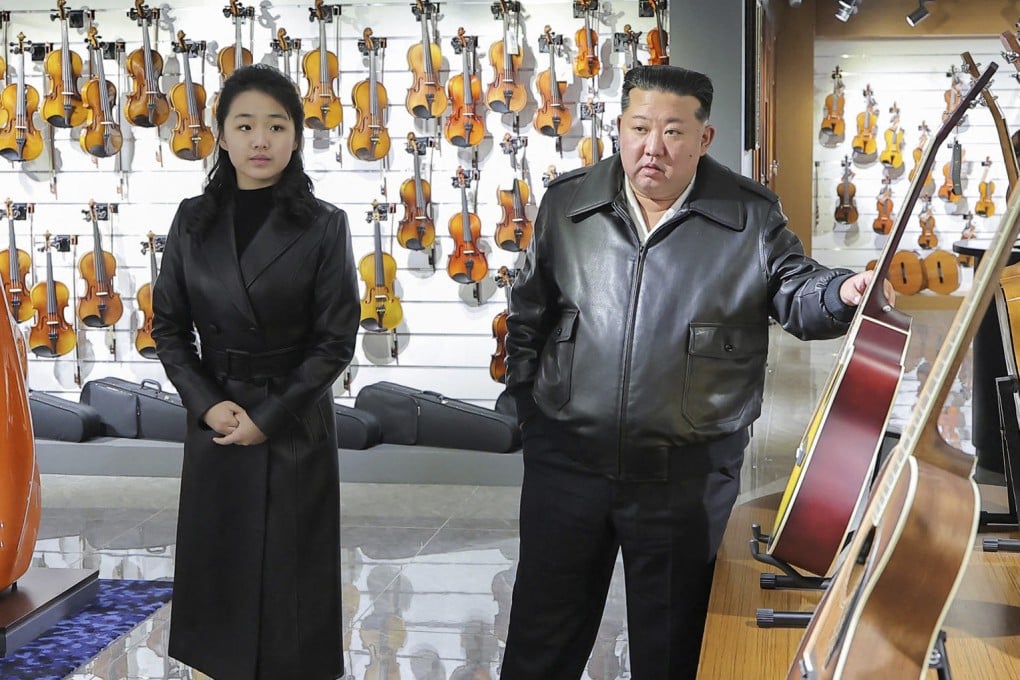North Korean leader Kim Jong-un and his daughter Ju-ae inspect a newly completed music shop in the Hwasong area of Pyongyang on Wednesday. Photo: KCNA/KNS/AFP