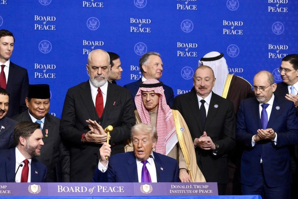 US President Donald Trump raises the gavel during the “Board of Peace” meeting in Washington on Thursday. Photo: EPA