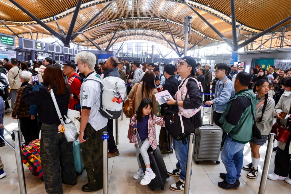 Hong Kong travellers leaving the city via the Hong Kong-Zhuhai-Macau Bridge. Photo: Jonathan Wong