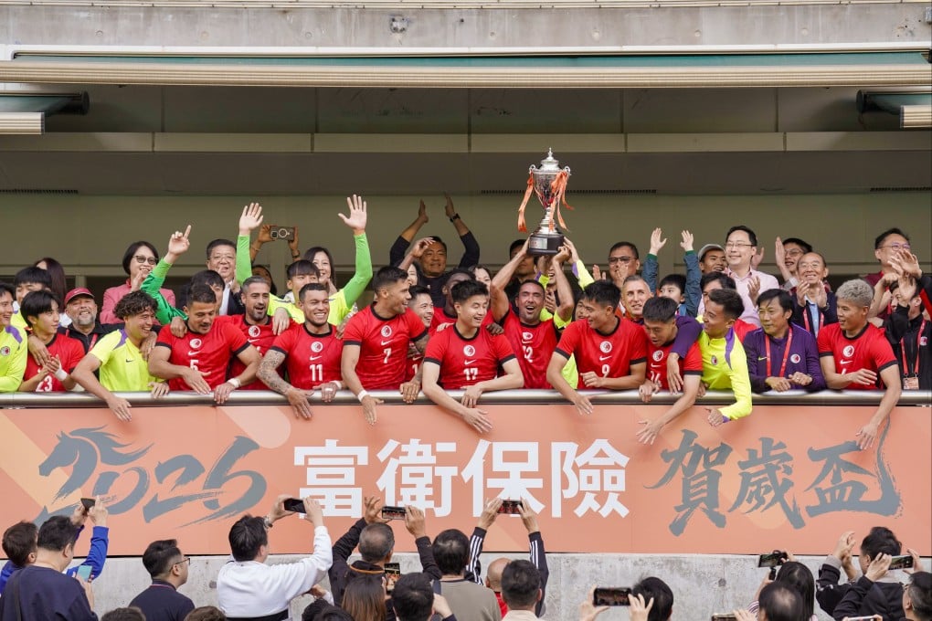 Fernando hoists the Chinese New Year Cup skywards as Hong Kong celebrate beating FC Seoul. Photo: Karma Lo