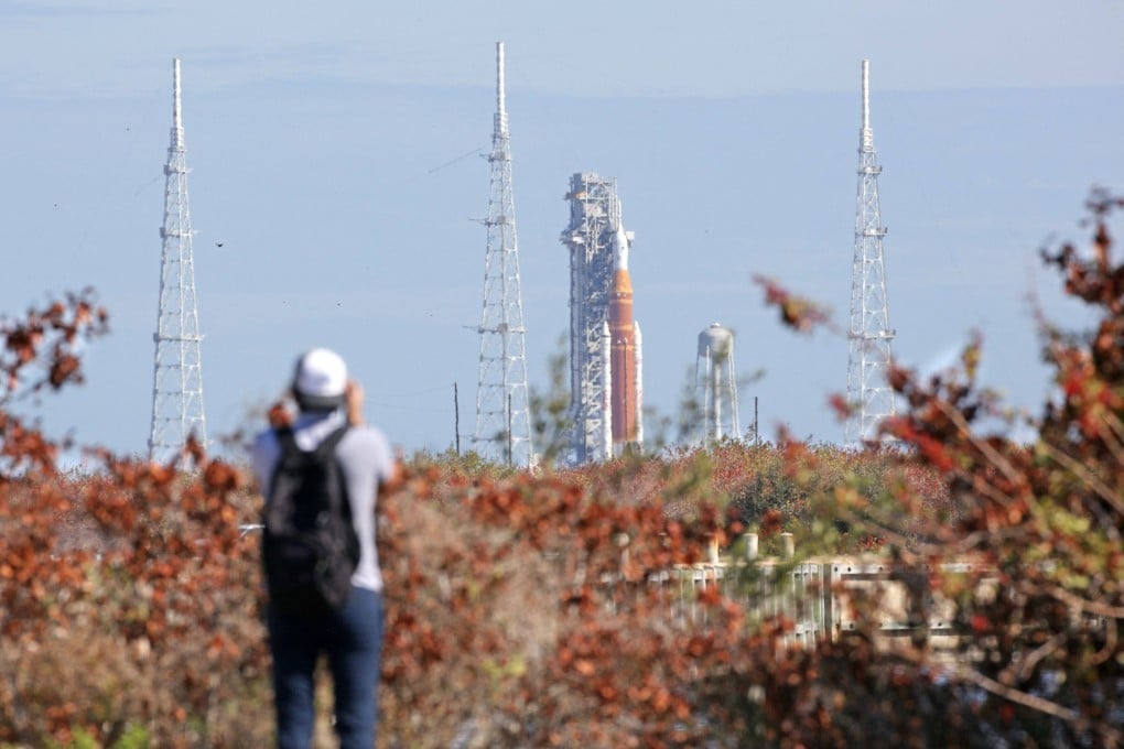 Nasa’s Artemis II Space Launch System rocket and Orion spacecraft are seen in the distance at the Kennedy Space Centre in Cape Canaveral, Florida, on Friday. Photo: AFP