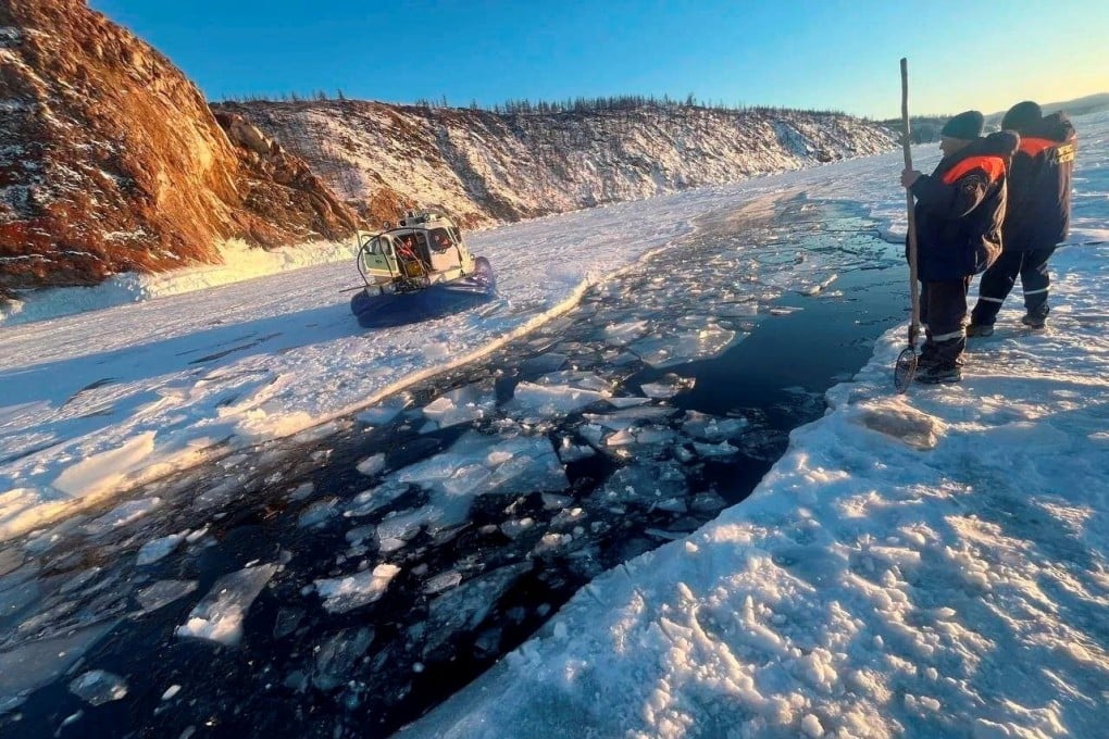 Rescuers work at the scene after a tour bus carrying Chinese tourists plunged into Russia’s Lake Baikal on Friday. Photo: Russia’s Investigative Committee in Irkutsk Region via Reuters