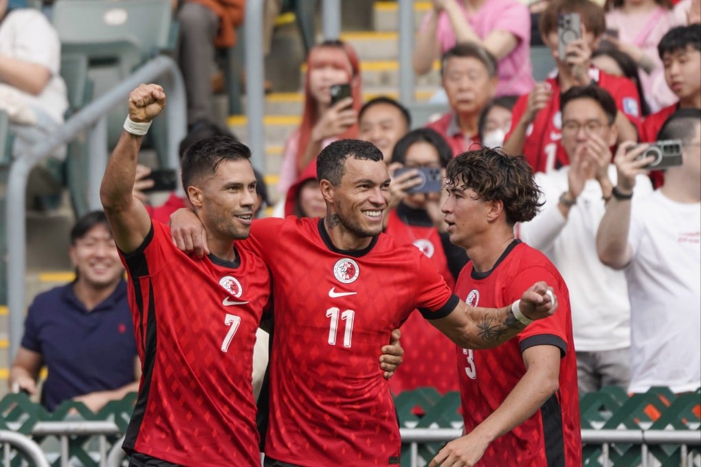 Jay Haddow (right) and Juninho (left) celebrate with Everton Camargo after linking for Hong Kong’s goal against FC Seoul. Photo: Karma Lo
