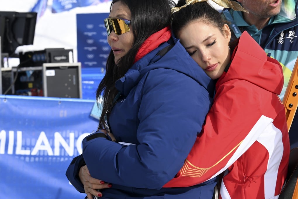 Gold medalist Eileen Gu hugs her mother Gu Yan after the awards ceremony for the freeski halfpipe final at the Milan-Cortina Winter Games in Livigno, Italy, on Sunday. Photo: Xinhua